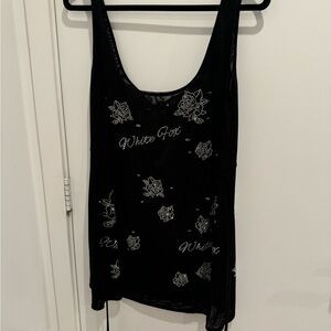 Black Sleeveless Top with White Floral Design